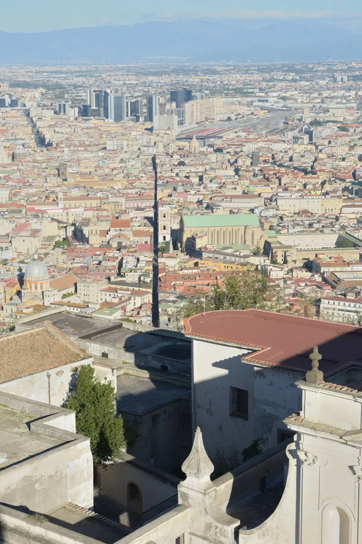 The straight line of Spaccanapoli cutting through the old city, seen from above